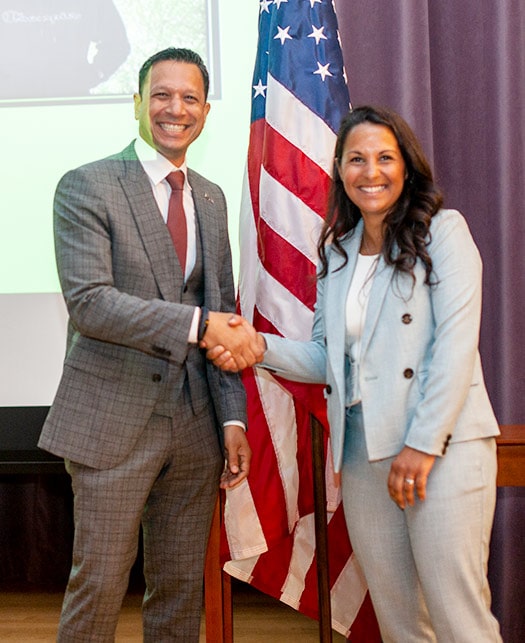 Ariléa Fernandez, FSYF Executive Director and Tarun Chopra, Clements CEO at an award ceremony.