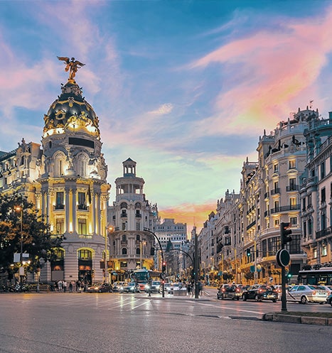 Busy streets with cars in Spain, a popular expat country.