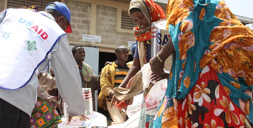 NGOs handing out aid to underserved community, often putting themselves are risk.